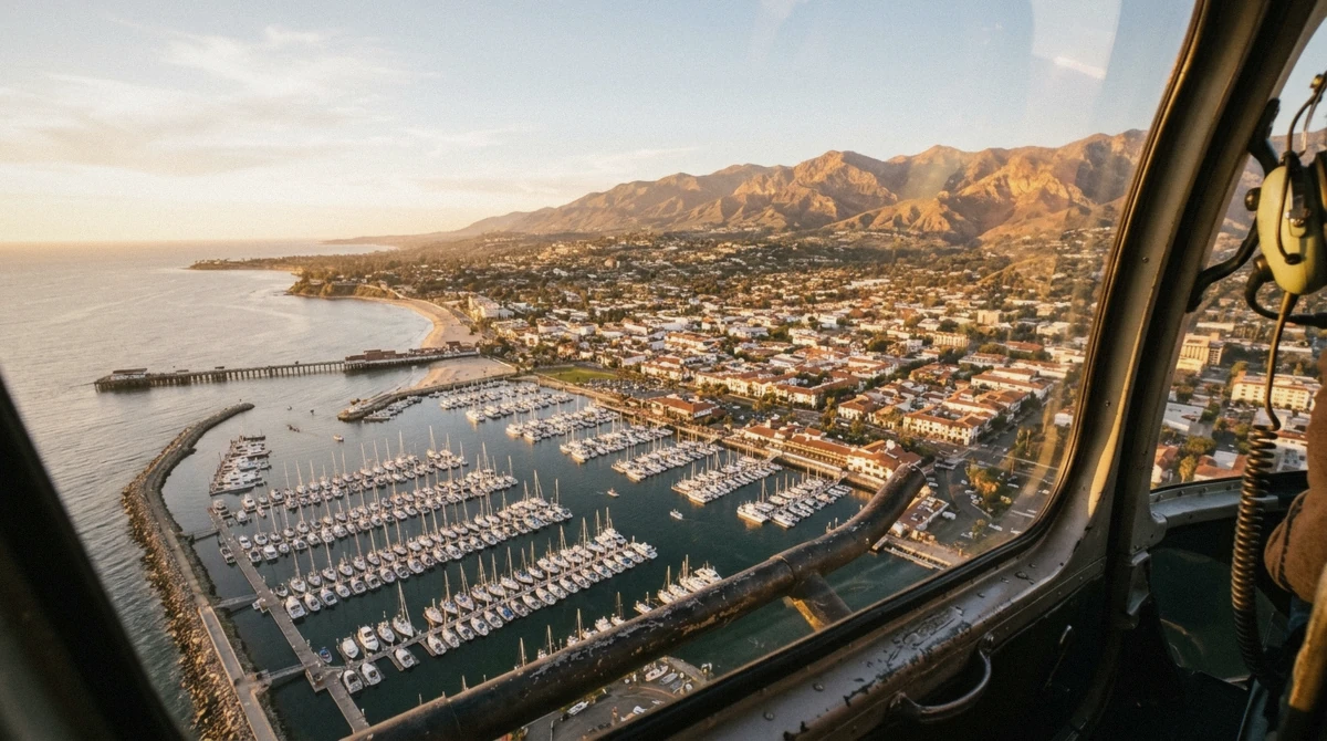 Golden late afternoon aerial view over Santa Barbara harbor from a santa barbara helicopter tour